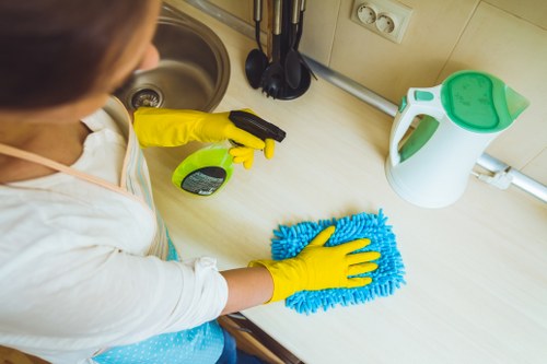Cleaning tools and protective gear arranged safely for use