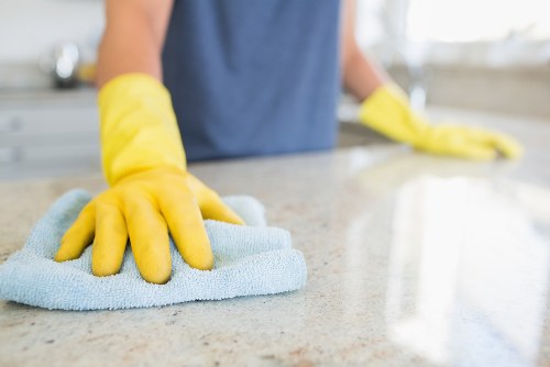 NW10 cleaning team performing deep cleaning in a kitchen